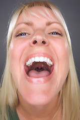 Image showing Laughing Blond Woman with Funny Face