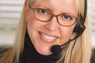 Image showing Attractive Businesswoman with Phone Headset