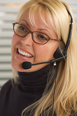 Image showing Attractive Businesswoman with Phone Headset