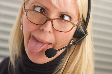 Image showing Attractive Businesswoman with Phone Headset