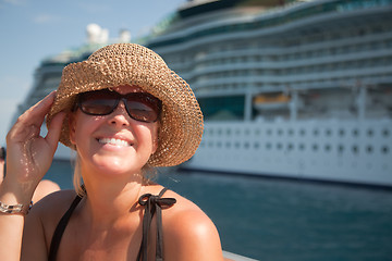 Image showing Beautiful Vacationing Woman with Cruise Ship