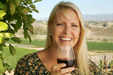 Image showing Attractive Woman Sips Wine