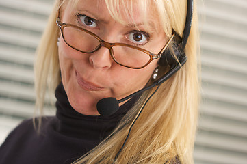 Image showing Attractive Businesswoman with Phone Headset