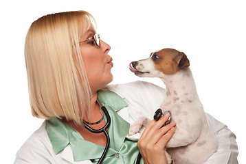 Image showing Attractive Female Doctor Veterinarian with Small Puppy