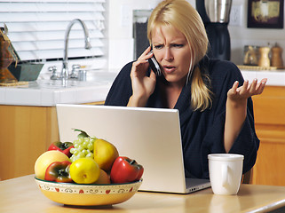 Image showing Woman on Cell Phone & Laptop