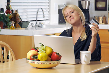 Image showing Woman Using Laptop for E-commerce