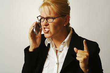 Image showing Angry Business Woman on Cell Phone