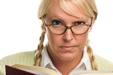 Image showing Serious Female with Ponytails and Book