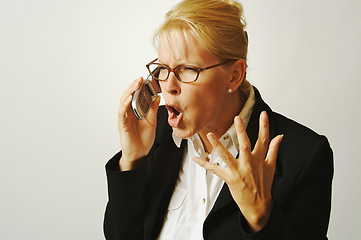 Image showing Angry Business Woman on Cell Phone