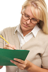 Image showing Beautiful Woman with Pencil and Folder 