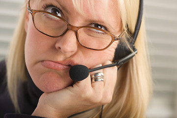 Image showing Attractive Businesswoman with Phone Headset