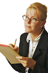 Image showing Beautiful Woman Thinks with Pencil & Notepad