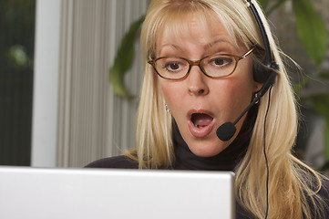 Image showing Attractive Businesswoman with Phone Headset