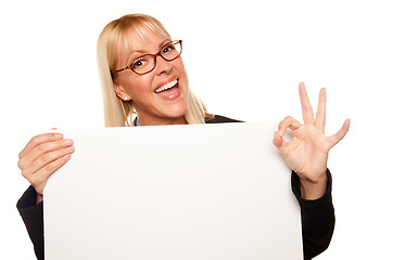 Image showing Attractive Blonde with Okay Hand Gesture Holding Blank White Sig