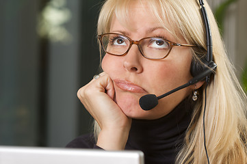 Image showing Attractive Businesswoman with Phone Headset