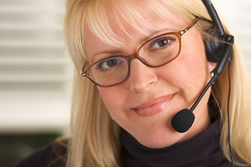 Image showing Attractive Businesswoman with Phone Headset