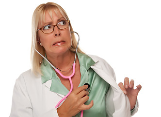 Image showing Attractive Female Doctor or Nurse Checking Her Own Heart