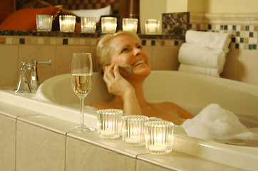 Image showing Woman in Bath Using Cell Phone