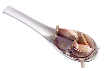 Image showing Garlic cloves on spoon