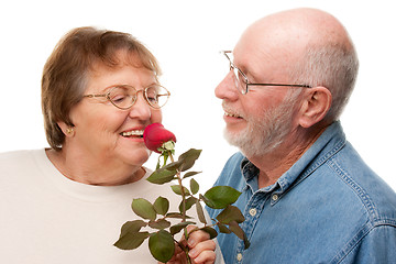 Image showing Happy Senior Couple with Red Rose