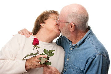 Image showing Happy Senior Couple Kissing with Red Rose