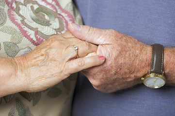 Image showing Senior Adult Couple Holding Hands
