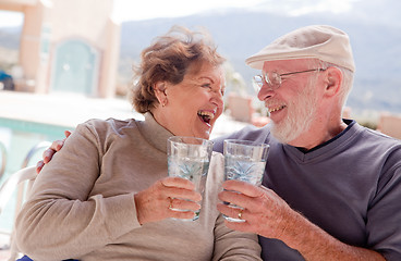 Image showing Happy Senior Adult Couple with Drinks