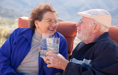 Image showing Happy Senior Adult Couple with Drinks