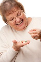 Image showing Attractive Senior Woman and Pills
