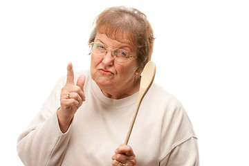 Image showing Upset Senior Woman with The Wooden Spoon
