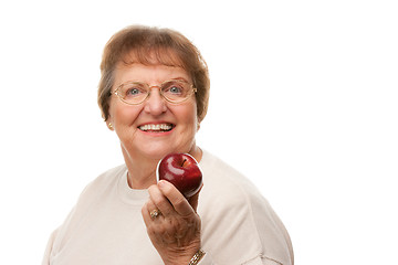 Image showing Attractive Senior Woman with Red Apple
