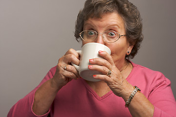 Image showing Senior Woman Enjoys Her Coffee