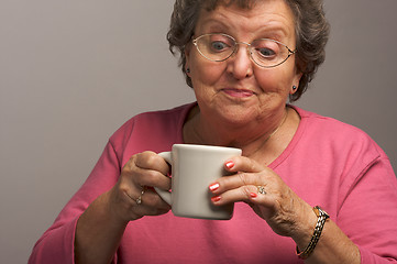 Image showing Senior Woman Enjoys Her Coffee