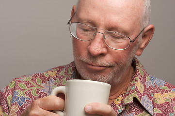 Image showing Senior Man Enjoys His Coffee