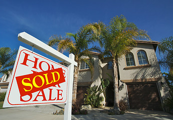 Image showing Sold Home For Sale Sign & New House