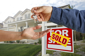 Image showing Handing Over the House Keys in Front of New Home