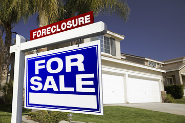 Image showing Foreclosure For Sale Real Estate Sign and House