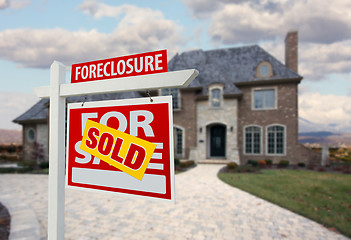 Image showing Sold Foreclosure Home For Sale Sign and House