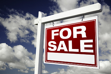 Image showing For Sale Real Estate Sign on Cloudy Sky