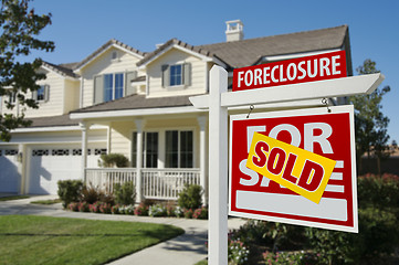 Image showing Sold Foreclosure Home For Sale Sign and House