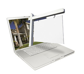 Image showing Blank Real Estate Sign & Laptop