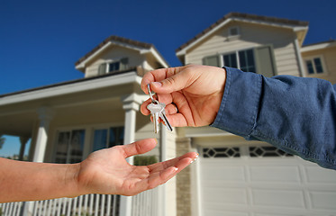 Image showing Handing Over the House Keys in Front of New Home