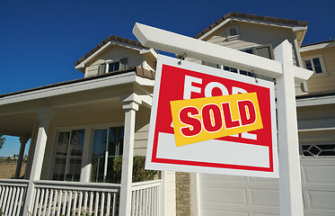 Image showing Sold Home For Sale Sign & New Home