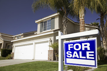 Image showing Blue For Sale Real Estate Sign and House