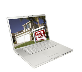 Image showing Home for Sale Sign & New House on Laptop