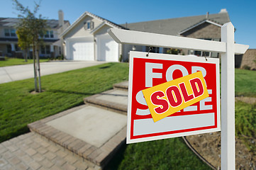 Image showing Sold Home For Sale Sign and House