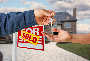 Image showing Handing Over the House Keys in Front of New Home