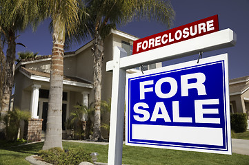 Image showing Foreclosure For Sale Real Estate Sign and House