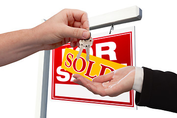 Image showing Agent Handing Over the Key to a New Home
