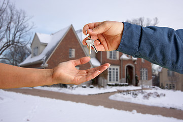 Image showing Handing Over the House Keys in Front of New Home